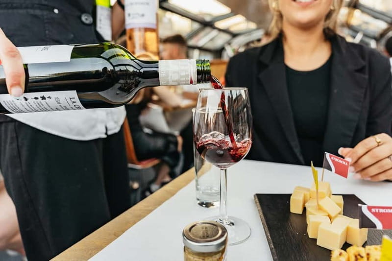 Amsterdam: Cozy Cheese & Wine Cruise Tasting Experience - The Canal Belt from a low, quiet vantage point