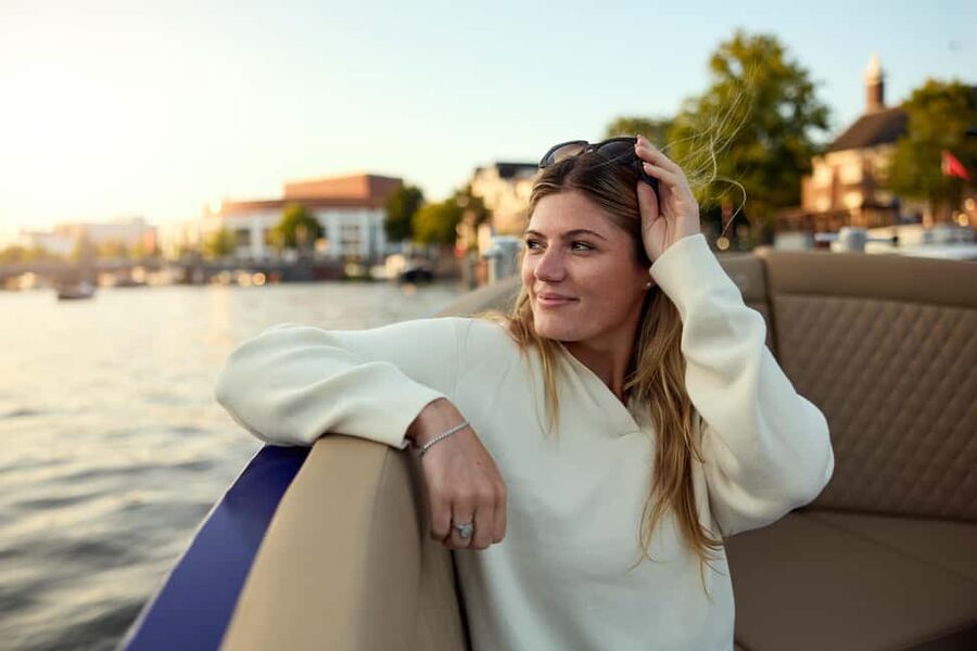 Amsterdam: Evening Candle Light Cruise With Wine & Cheese - Red Light District, Sea Palace, and NEMO from the canal