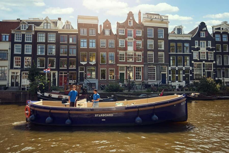 Amsterdam: Evening Candle Light Cruise With Wine & Cheese - Seven Bridges and the Prinsengracht