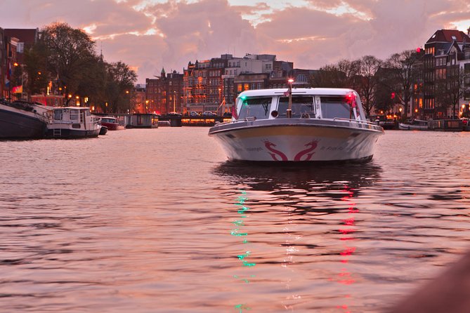 Amsterdam Evening Cocktail Cruise with snacks - A night cruise through Amsterdam’s glowing canals