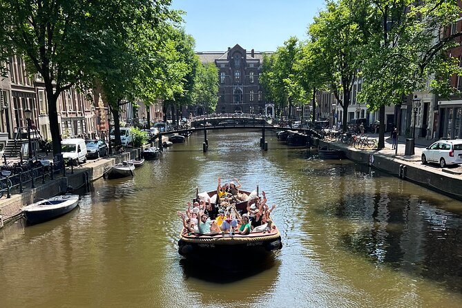 Amsterdam Luxury Boutique Boat tour with Unlimited Beer and Wine - A quick canal introduction with a party-boat feel