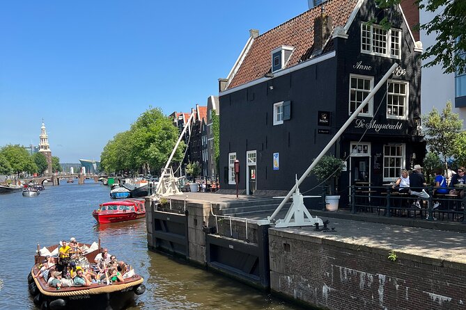 Amsterdam Luxury Boutique Boat tour with Unlimited Beer and Wine - The Magere Brug and the final canal views