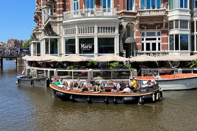 Amsterdam Luxury Boutique Boat tour with Unlimited Beer and Wine - Guide quality can make or break the ride