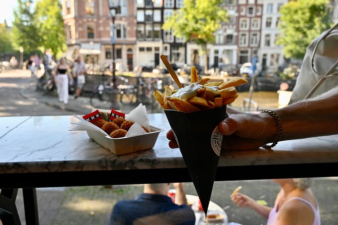 Amsterdam Private Food & Drinks Tour by UNESCO Canals & Jordaan - Spui, the Flower Market, and a secret garden