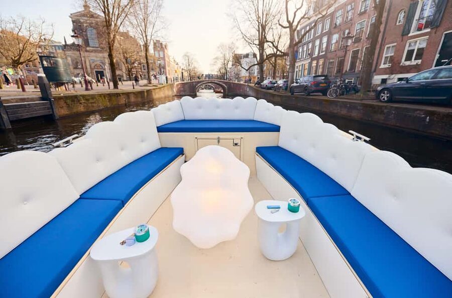 Amsterdam: Smoke & Cruise on covered Cannabis Boat With Bar - From Oudezijds Voorburgwal to the Red Light District