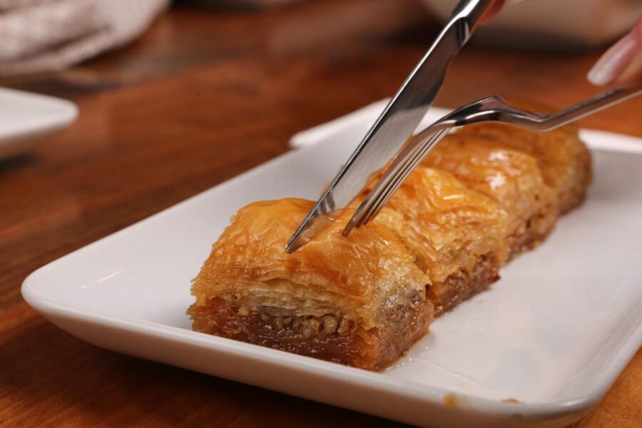 Athens: Street Food Tasting Tour - Loukoumades bring the honey and cinnamon