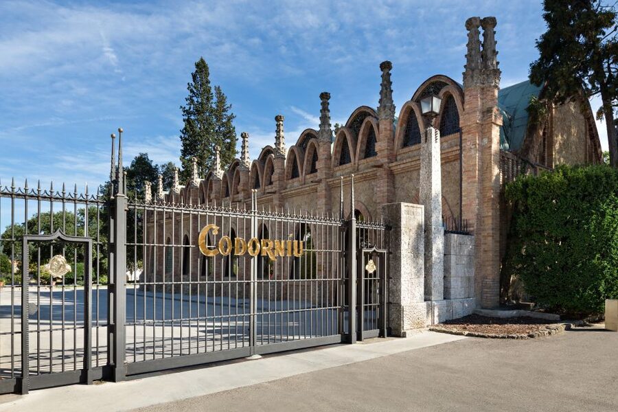 Barcelona: Casa Codorníu Guided Tour with Cava Tastings - Walking through the modernist gardens