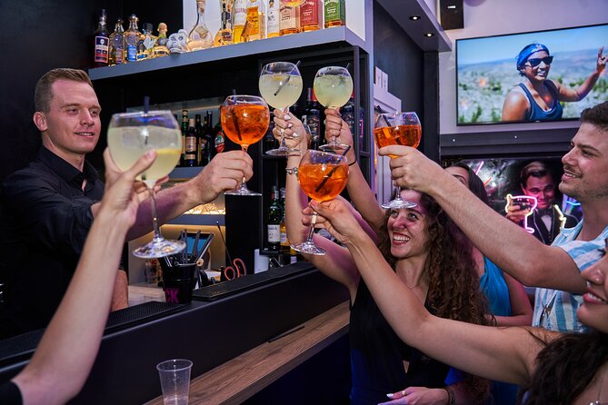 Barcelona Dark History Night Walking Tour With Drinks - The Social Side and Group Size