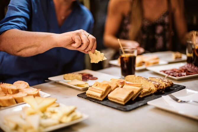 Barcelona Gothic Quarter Tapas & Taverns Food & Wine Tour - Stop one: charcuterie and potato specialties at Placeta del Pi
