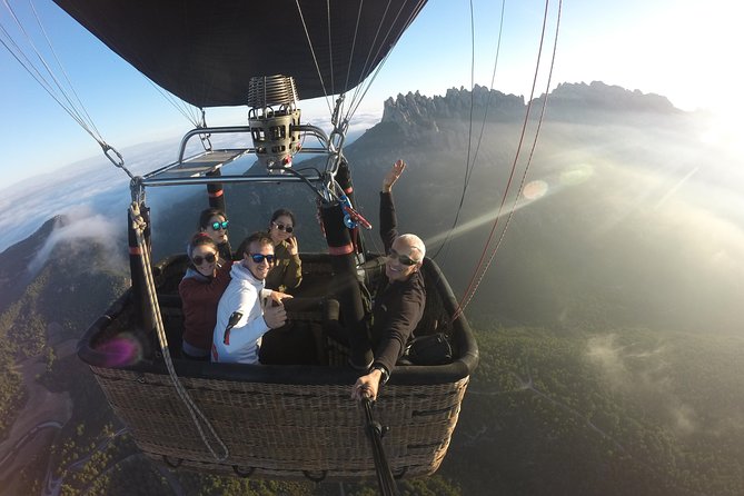 Barcelona: Montserrat Hot Air Balloon Ride with Champagne Toast - The early pickup from central Barcelona
