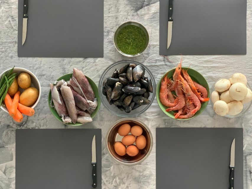 Barcelona: Rooftop Tapas and Sangria Class with a Chef - Eating above Port Vell at sunset