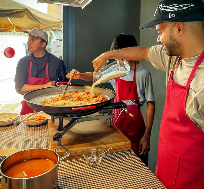 Barcelona: Seafood Paella ★Maestro★ & Tapas & Sangria - Cooking paella together, not in separate stations