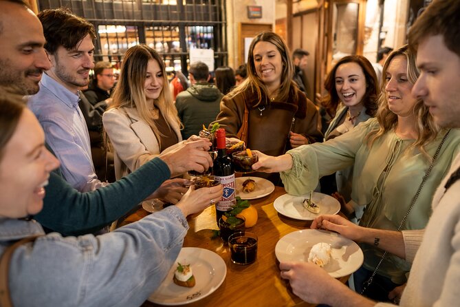 Barcelona Side Streets Tapas & Wine Tour - First stop: Catalan food and wine from a porrón
