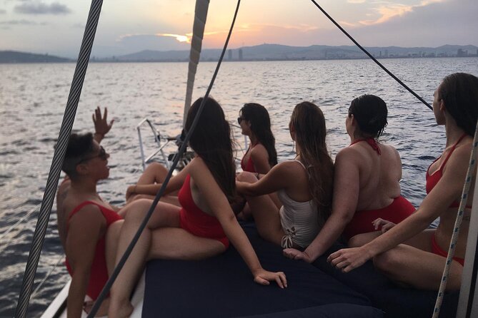 Barcelona Sunset Sailing with Open Bar of Cava and Snacks - Captains set the tone