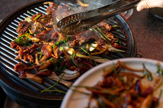 Beijing Hutong Walking Food and Beer Tour at Hidden Restaurants - Second stop: spring pancakes with a husband-and-wife team
