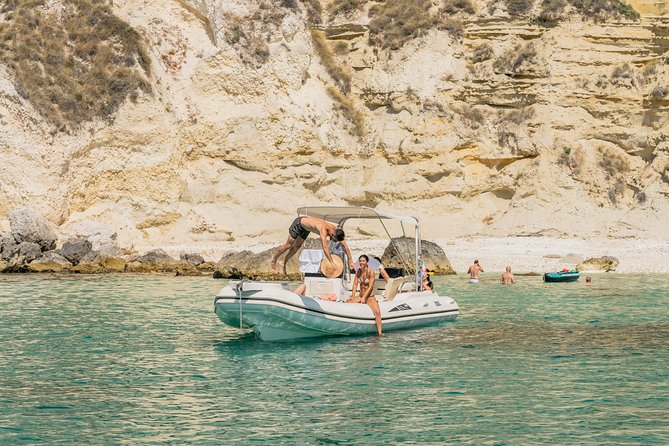 Boat Tour at Devil's Saddle: 4 Swim Stops, Snorkeling & Prosecco - Cala Fighera brings cliffs and open water