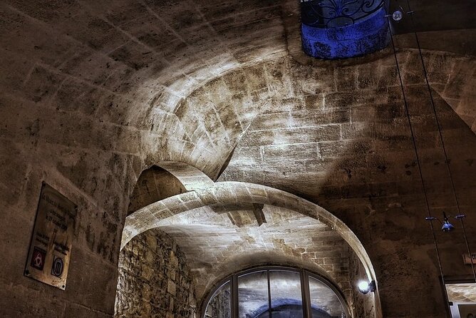 Bordeaux Wine and Trade Museum Admission Ticket with Wine Tasting - Walking through the 1720 vaulted cellars