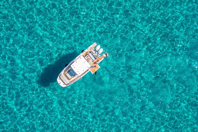 Cagliari 3 Hours Luxury Motorboat Tour - Wine and Snorkeling - Seeing Sella del Diavolo from the sea