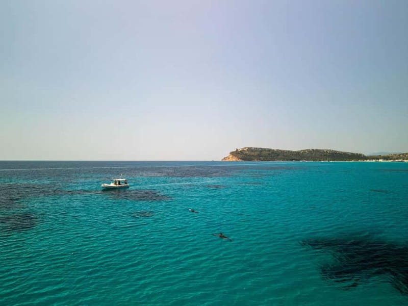 Cagliari: Boat Cruise with Stops for Swimming and Prosecco - What the skipper adds to the experience