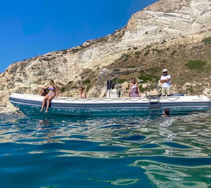 Cagliari: Boat Tour with Snorkeling, GoPro & Sardinian Beer - Cala Mosca: your first real swim