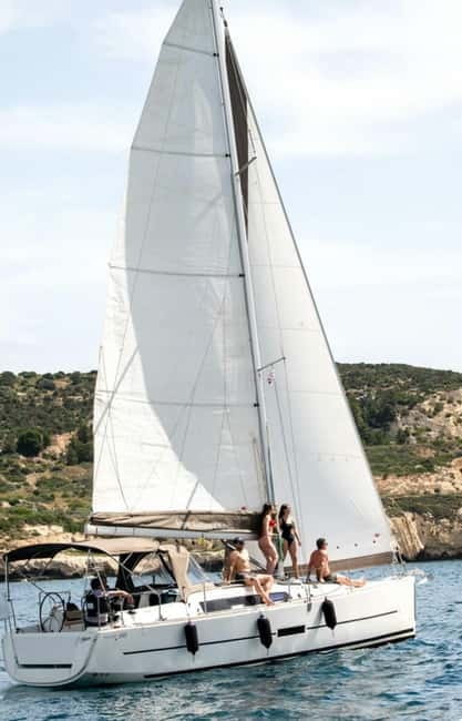 Cagliari: Catamaran Tour, Swimming, Snorkeling, & Prosecco - Cala Bernat and the first views from the catamaran