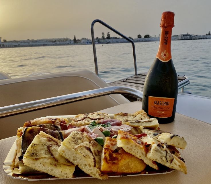Cagliari: Sunset Boat Tour with Aperitif and Prosecco - Reaching Sella del Diavolo by boat