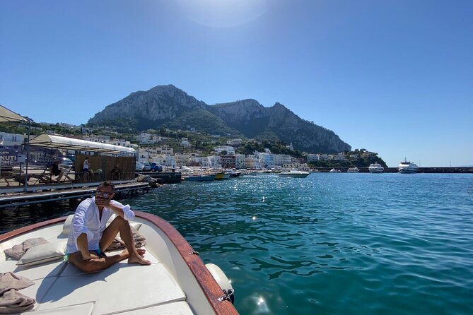 Capri Boat Tour: Grottoes, Swim & Sip Limoncello in a Small Group - The Natural Arch and Villa Malaparte