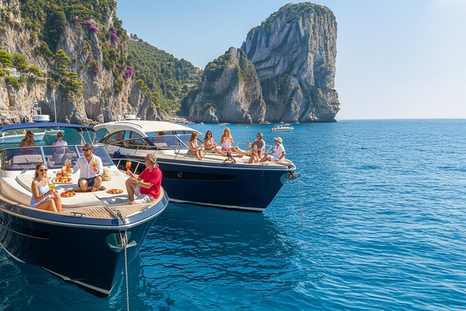 Capri in a Day: Boat Tour + City Visit + Free Bar + Brunch - Punta Carena and the western coast