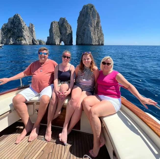 Capri: Scenic Boat Tour with Swimming, Limoncello & Snack - Salto di Tiberio and the northern cliffs