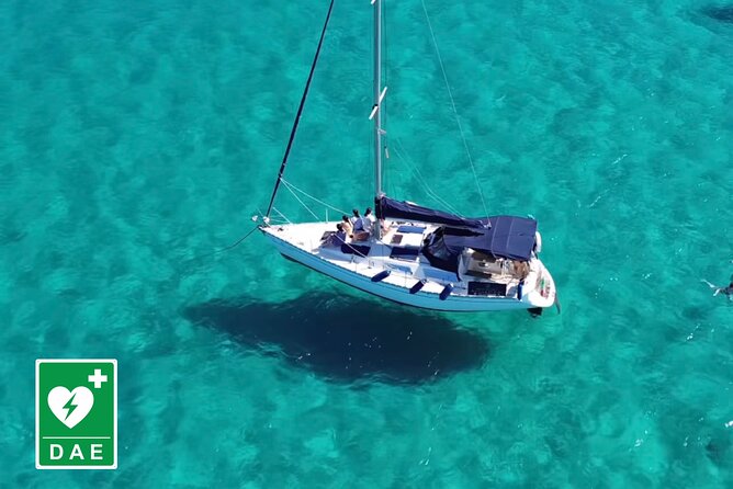 Catamaran tour stops bathing and snorkeling toast with prosecco - The port, old defenses, and Capo Sant’Elia