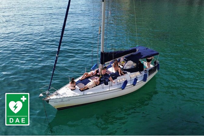 Catamaran tour stops bathing and snorkeling toast with prosecco - Grotta dei Colombi and the Devil’s Saddle