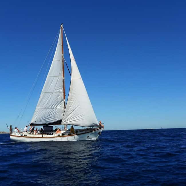 Catania: Boat Trip with Aperitif, Prosecco and Snorkeling - Ognina and the Ulysses Caves