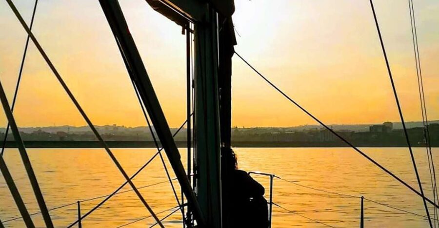 Catania: Guided Sunset Sailing Trip with Aperitif & Prosecco - Reaching the Ulysses Caves