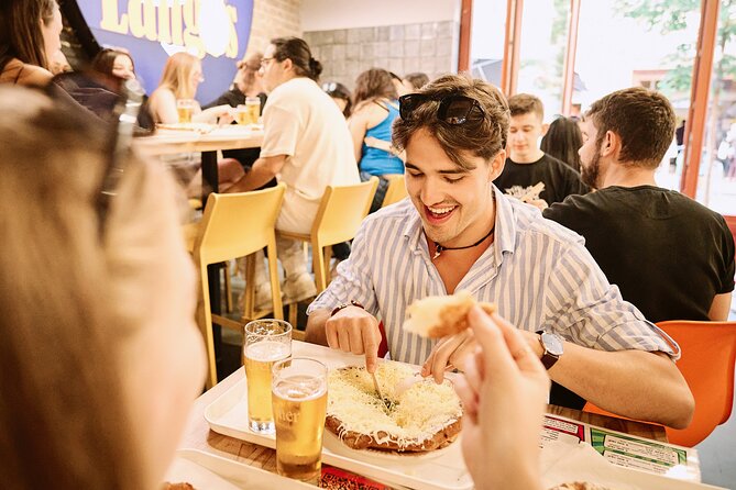 Central Budapest Food Walking Tour with Drinks Included - Hungarian stew, chicken paprikash, and pálinka