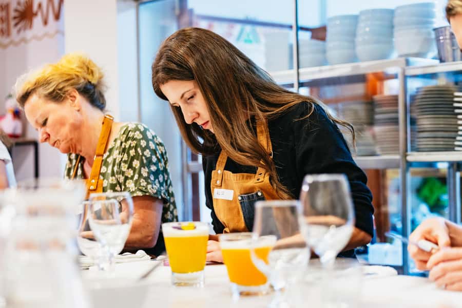 Cusco: Peruvian Cooking Class, Cocktails & Local Market Tour - Picarones finish the four-hour experience