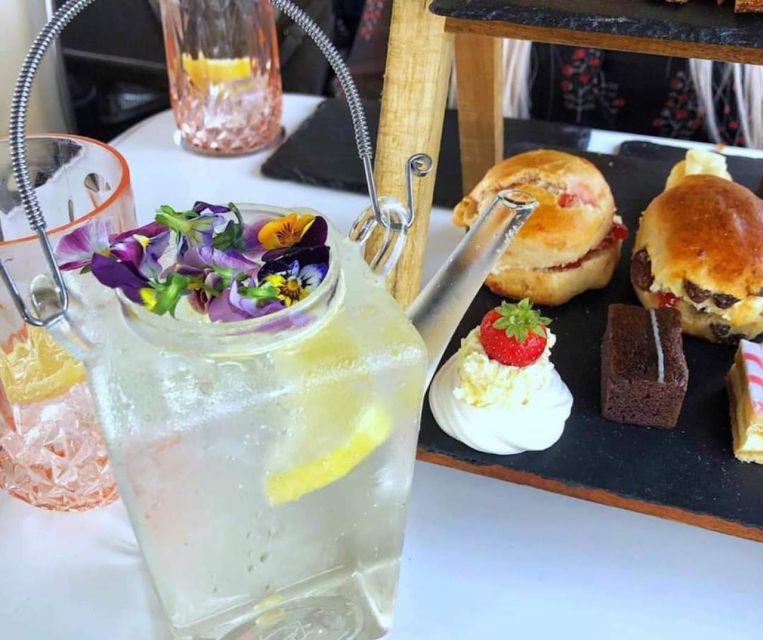 Edinburgh: Vintage Bus Tour with Afternoon Tea or Gin - The gin teapot adds a playful Edinburgh twist