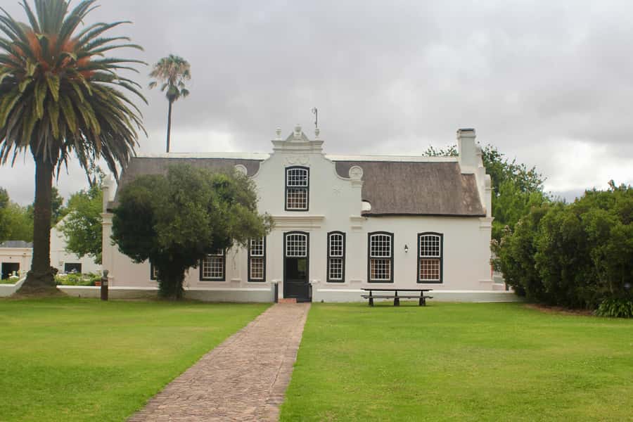 From Cape Town: Winelands Full Day Tour and Wine Tasting - Paarl, Drakenstein Prison, and the return route