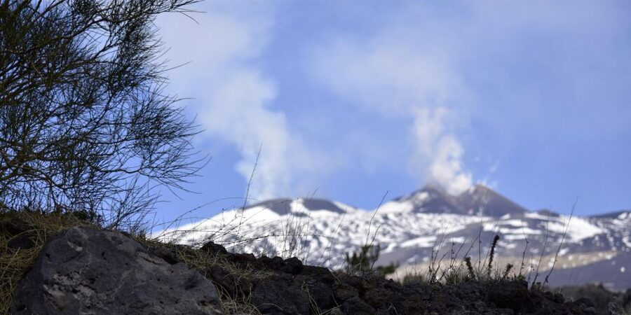 From Catania: trek on Mount Etna, Lava Cave & tasting Tour - Walking the craters at the Sapienza Refuge