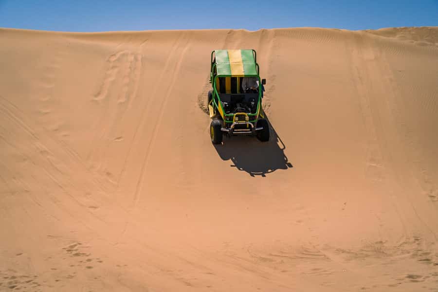 From Lima: Ballestas Islands, Huacachina, and Vineyard Tour - Lunch in Ica, then the Huacachina oasis