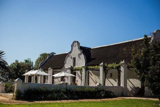 Full Day Small Group Wine Tour Cape Town and Stellenbosch - Simonsig begins with sparkling wine and sabrage