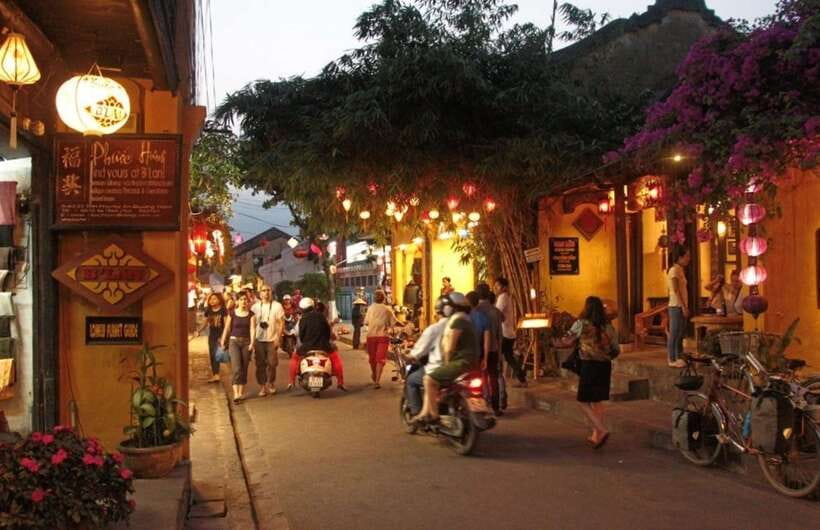 Hoi An: Sunset Food Tasting Tour - Rice cakes, black sesame soup, and local sweets