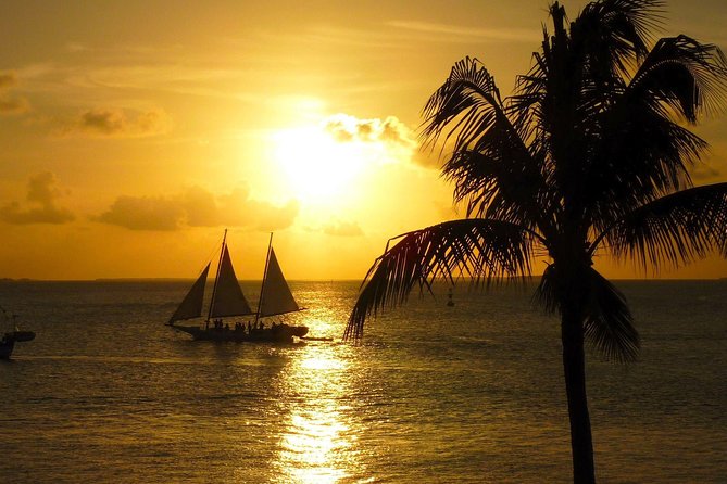 Key West Small-Group Sunset Sail with Wine and Hors d'oeuvres - Leaving Front Street for a quieter Key West evening