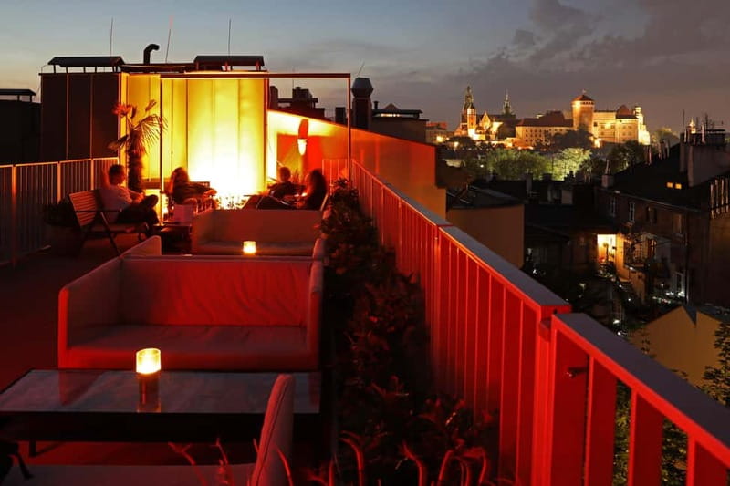 Krakow: Hidden Rooftop Bar Reservation with 1 Cocktail - The included cocktail and the extra cost