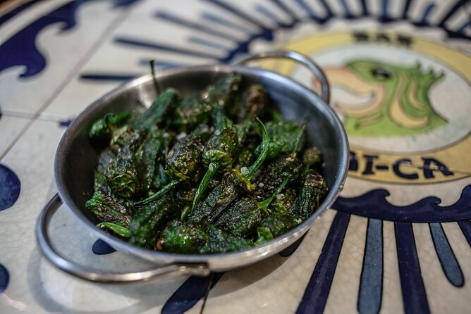 La Barceloneta Tapas & Wine & Drinks Tour in Barcelona - L’Òstia: seafood and the Barceloneta bomb