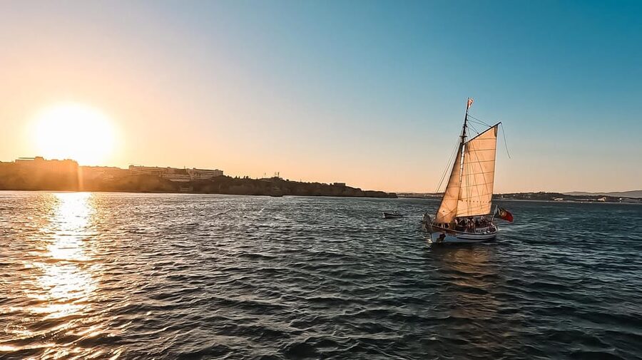 Lagos: Sunset Sail aboard a Traditional Boat with Prosecco - Sunset timing and the trip back