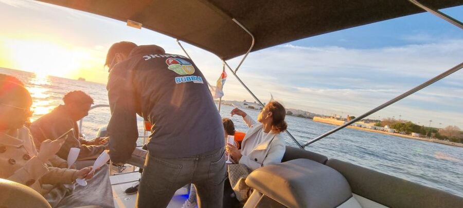Lisbon: Boat Tour with Champagne - Champagne, sunset, and the feel of the boat