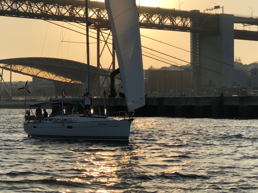 Lisbon: Private Sunset Sailing Tour with Champagne - Returning past central Lisbon