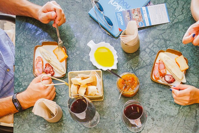 Lisbon Small-Group Portuguese Food and Wine Tour - Rua da Madalena brings out the bifana