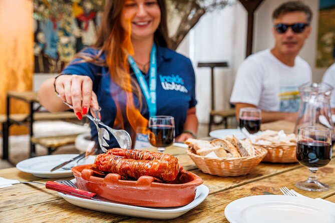 Lisbon Small-Group Portuguese Food and Wine Tour - Port, cheese, chouriço, and the daily rice dish