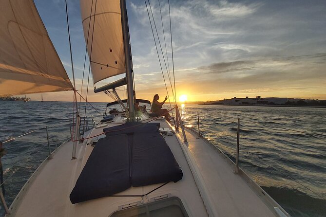 Lisbon: Sunset Sailing with Portuguese Wine and History - The westbound run to Belém